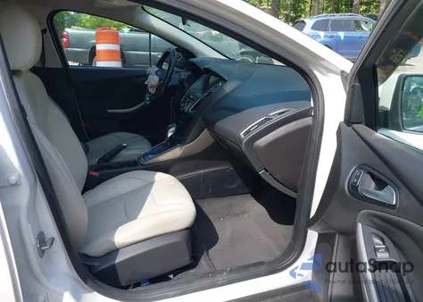 2016 Ford Focus Titanium from USA, damaged, VIN 1FADP3N22GL239282